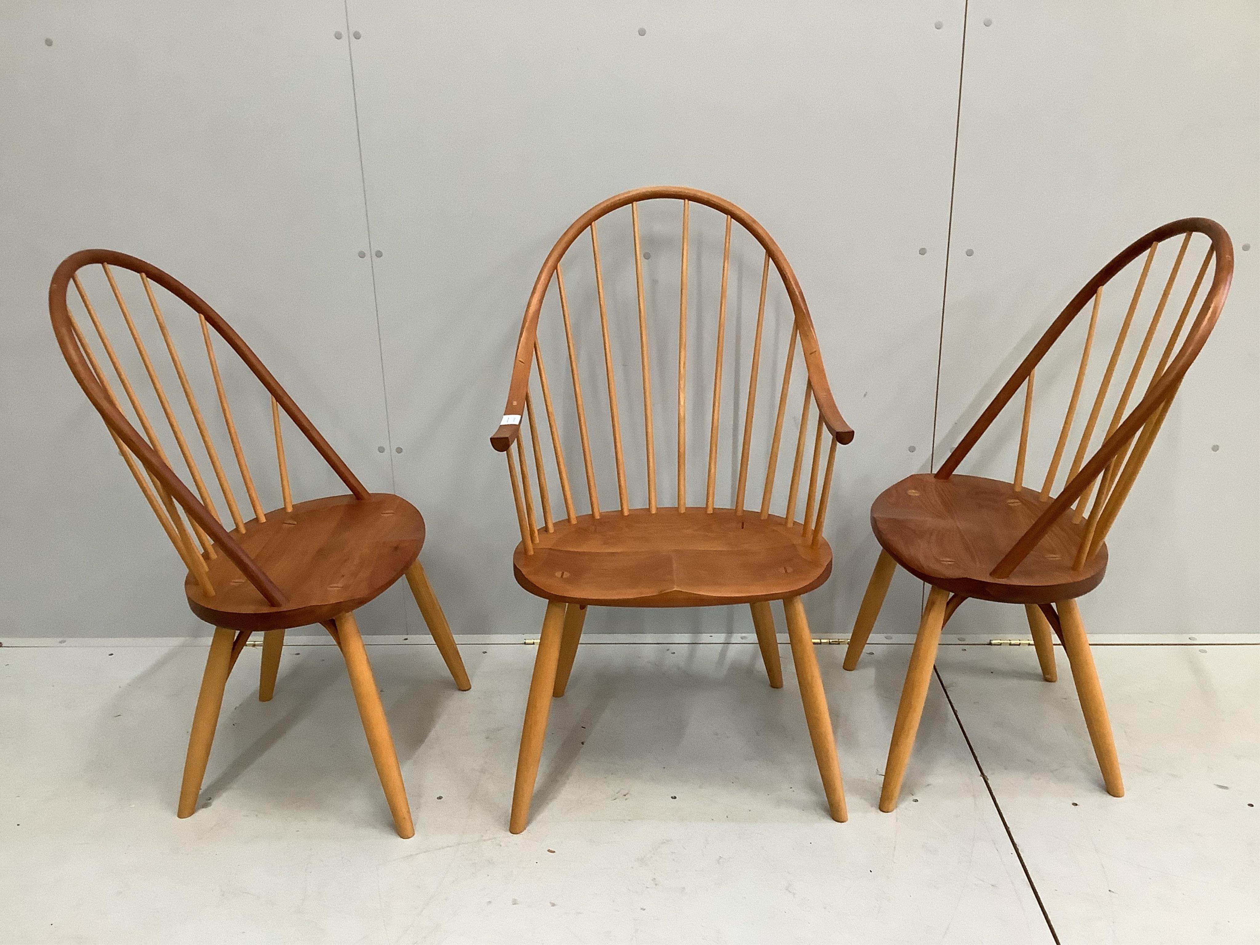 A Thomas Moser cherrywood hoop back armchair and two single chairs, largest width 59cm, depth 56cm, height 105cm. Condition - good
